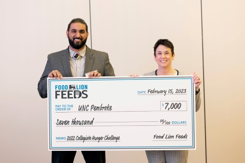 L-R: Sandy Jacobs, Director of Community and Civic Engagement, UNC Pembroke; and Meg Ham, President, Food Lion.